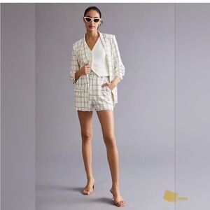Anthropologie Cream Apparel Set
Blazer and shorts